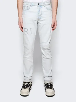 Amiri Crystal Logo Distressed Jeans Bleached Indigo