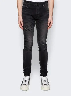 Amiri Crystal Logo Distressed Jeans Faded Black