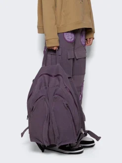 WHO DECIDES WAR Pocketed Book Bag Violet